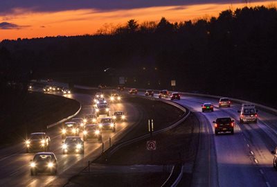 Traffic on a busy highway at night.
